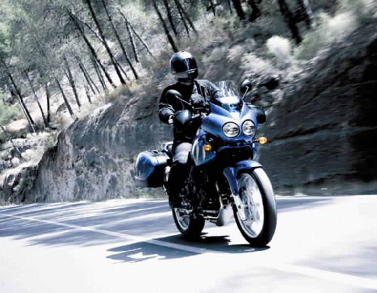 2006 Triumph Tiger cruising down the road