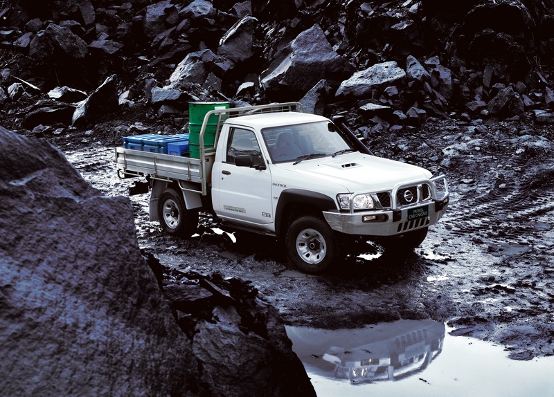 A white UY61 Nissan Patrol cab chassis