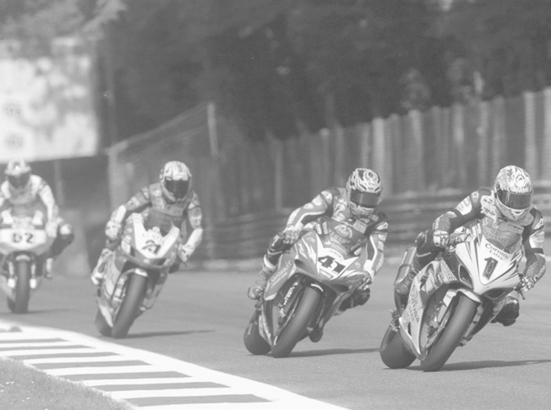 Pack of Superbikes getting ready to take a corner