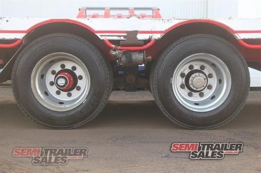 1982 LOMBARDI SEMI LOW LOADER DROP DECK TRAILER WITH RAMPS