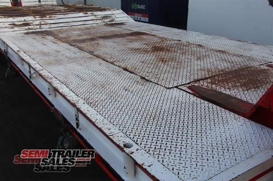 1982 LOMBARDI SEMI LOW LOADER DROP DECK TRAILER WITH RAMPS