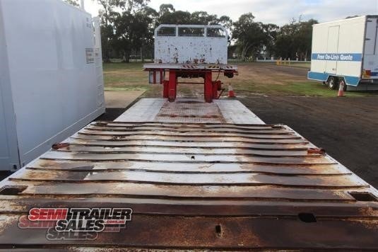 1982 LOMBARDI SEMI LOW LOADER DROP DECK TRAILER WITH RAMPS