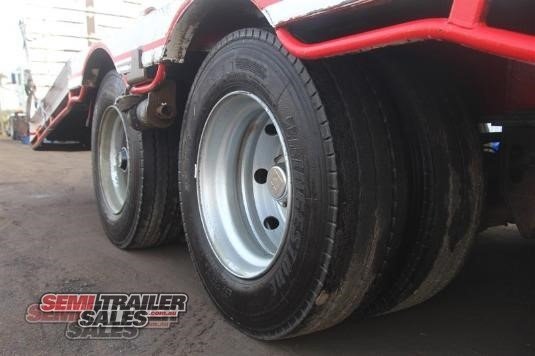 1982 LOMBARDI SEMI LOW LOADER DROP DECK TRAILER WITH RAMPS