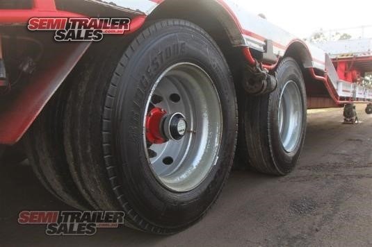 1982 LOMBARDI SEMI LOW LOADER DROP DECK TRAILER WITH RAMPS