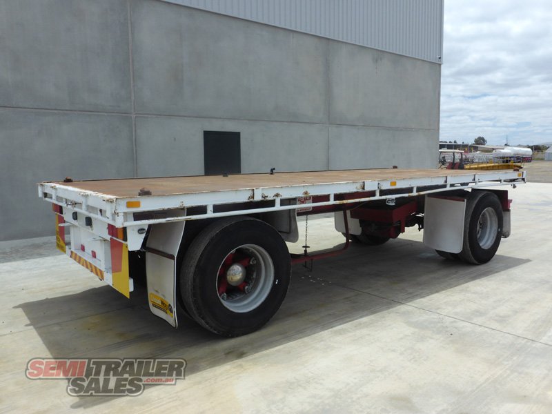 1992 WHITE TWO AXLE FLAT TOP DOG TRAILER