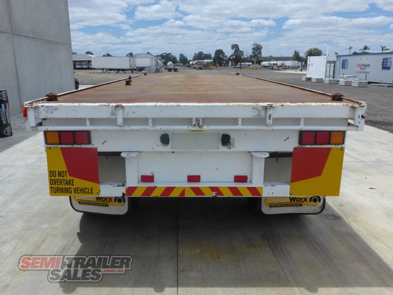 1992 WHITE TWO AXLE FLAT TOP DOG TRAILER