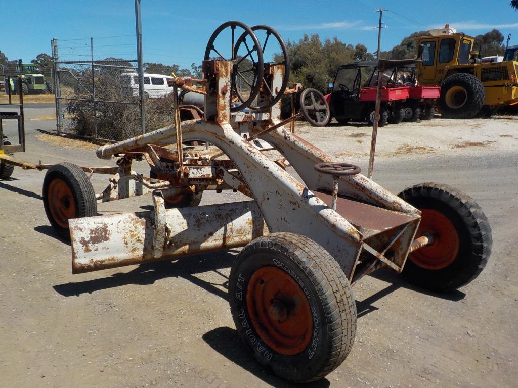 TOW BEHIND GRADER