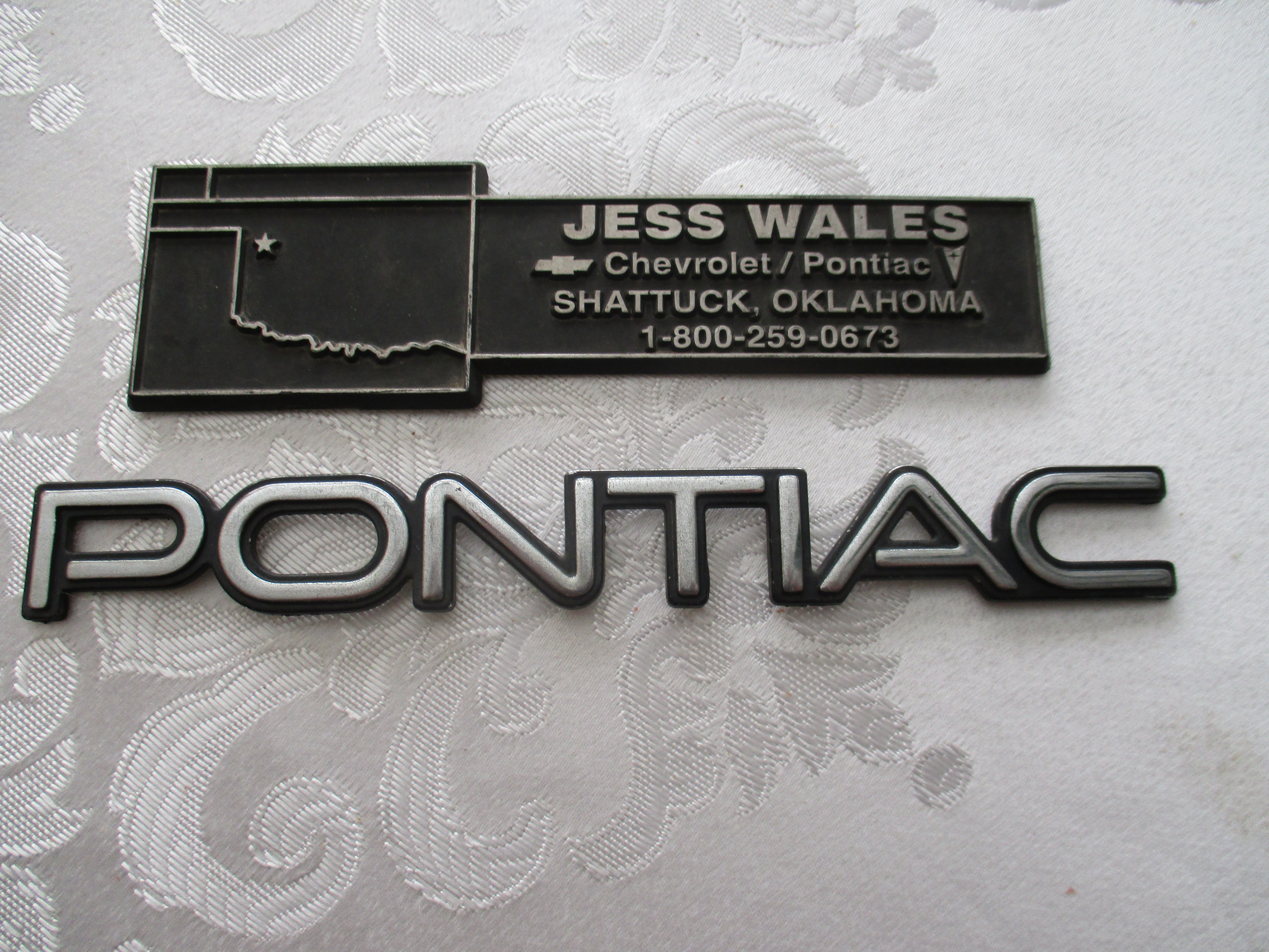 PONTIAC EMBLEM & DEALER TRUNK TAG 