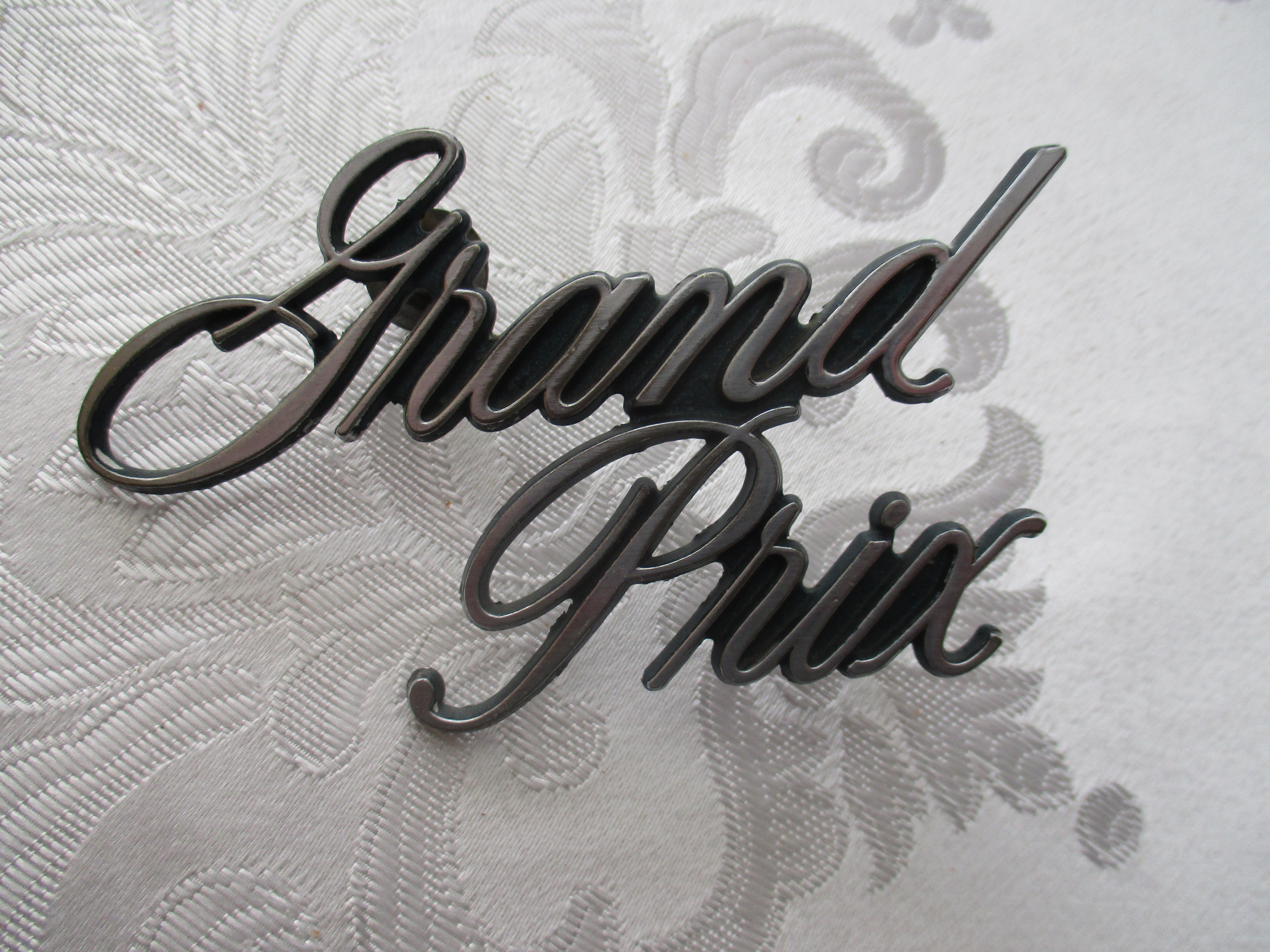 PONTIAC GRAND PRIX EMBLEM all pins complete 