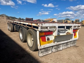 PEAK ENGINEERING QUAD AXLE FLAT TOP TRAILER
