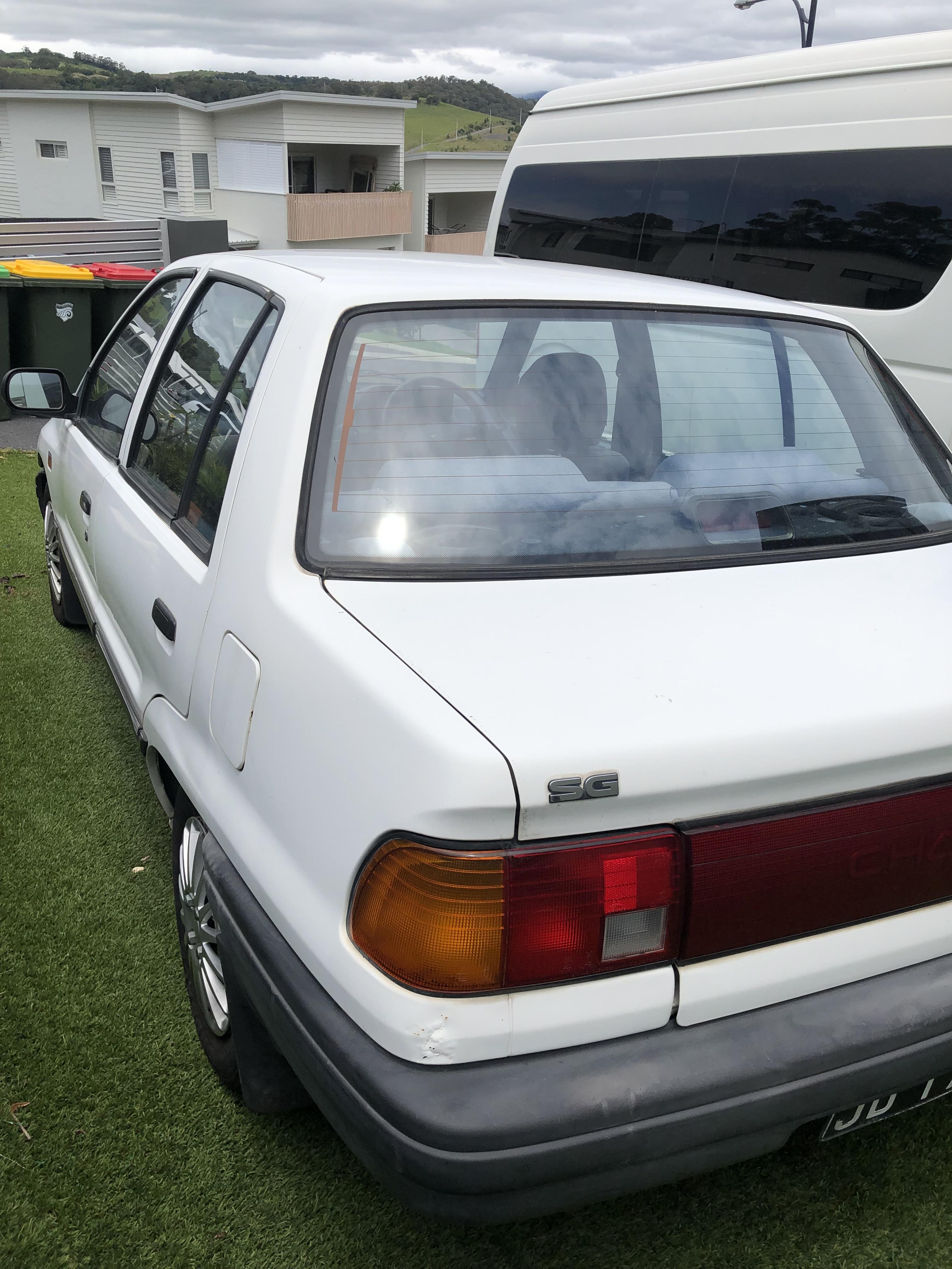 1992 DAIHATSU CHARADE SG 3 SP AUTOMATIC 4D SEDAN