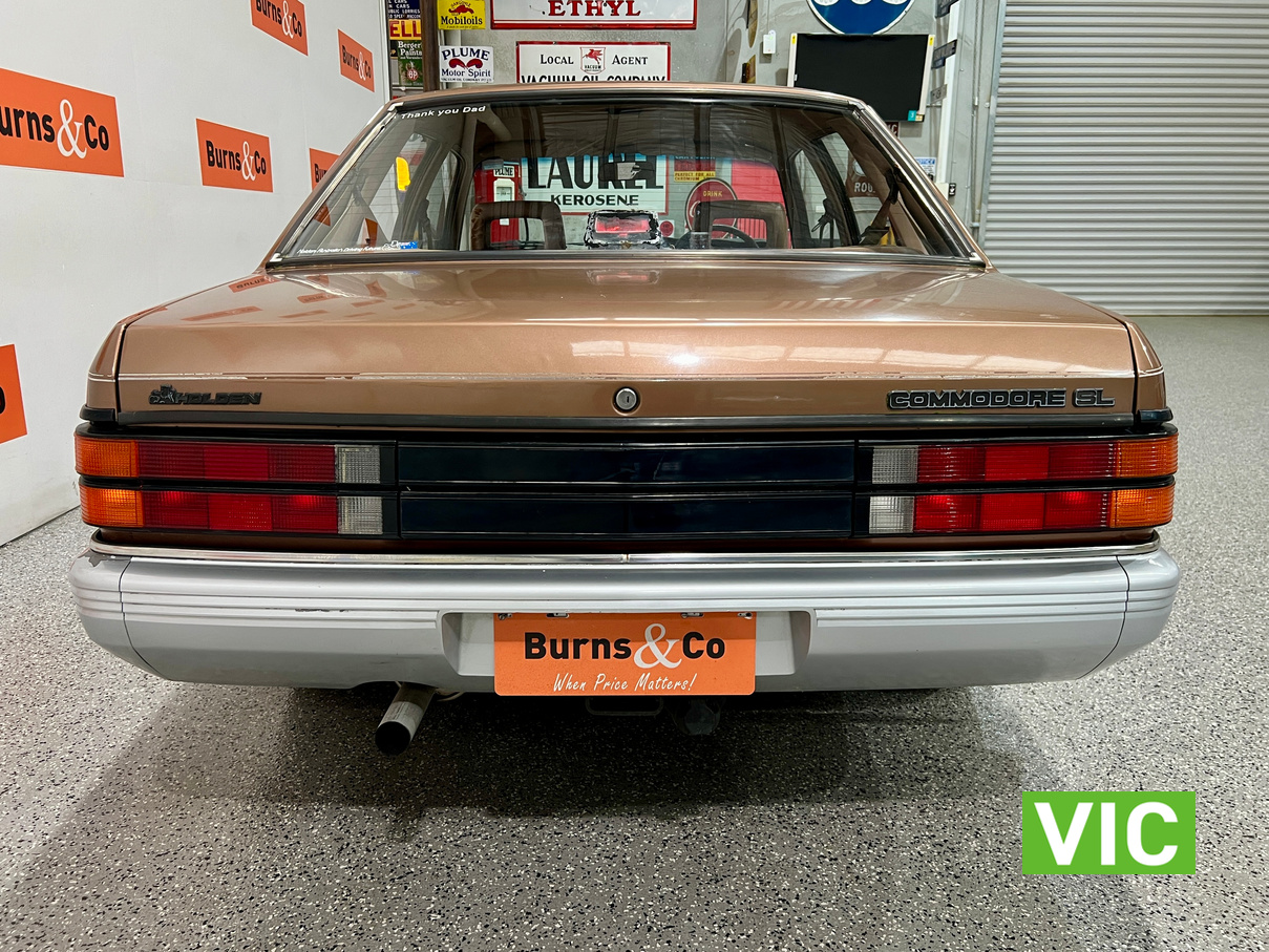 1985 HOLDEN VK COMMODORE SL 6 CYL MANUAL SEDAN 