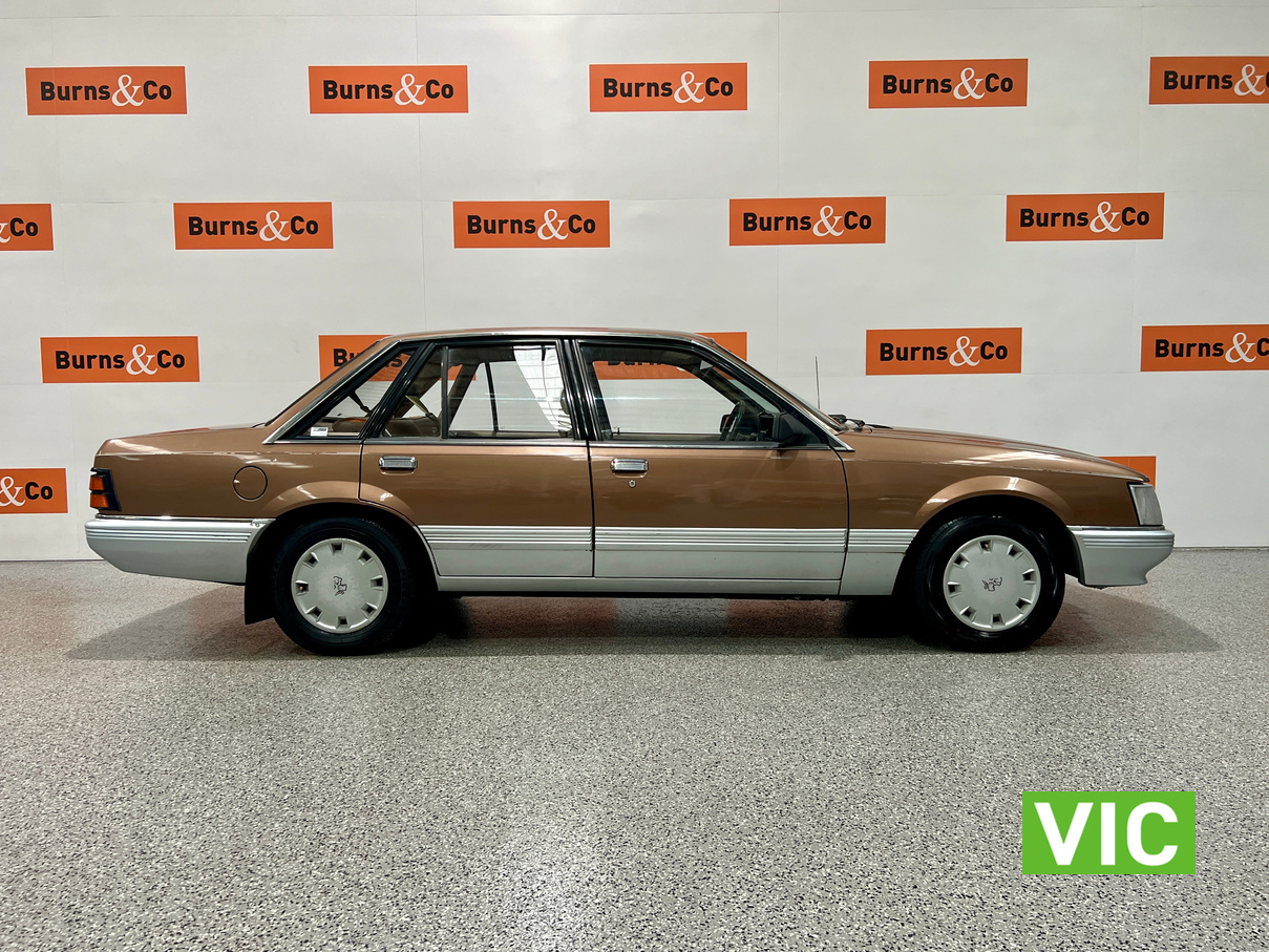 1985 HOLDEN VK COMMODORE SL 6 CYL MANUAL SEDAN 