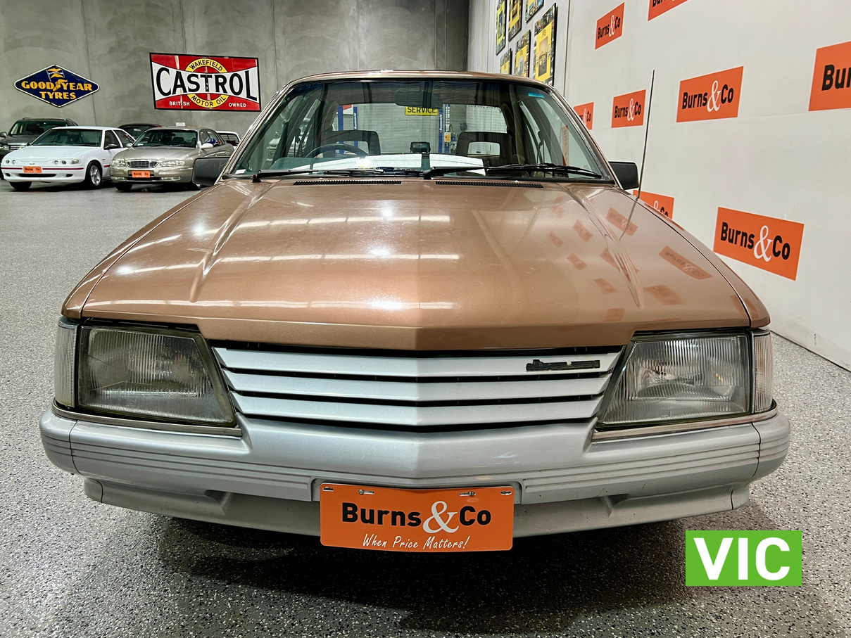 1985 HOLDEN VK COMMODORE SL 6 CYL MANUAL SEDAN 