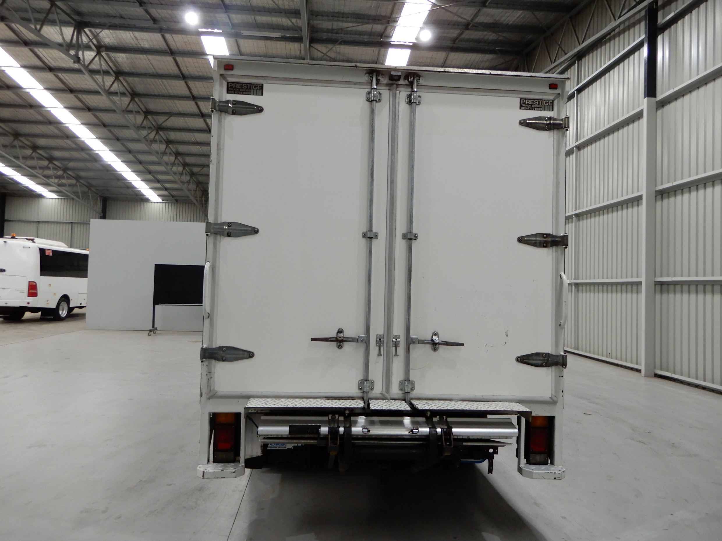 2012 ISUZU NPR200 TRUCK PANTECH
