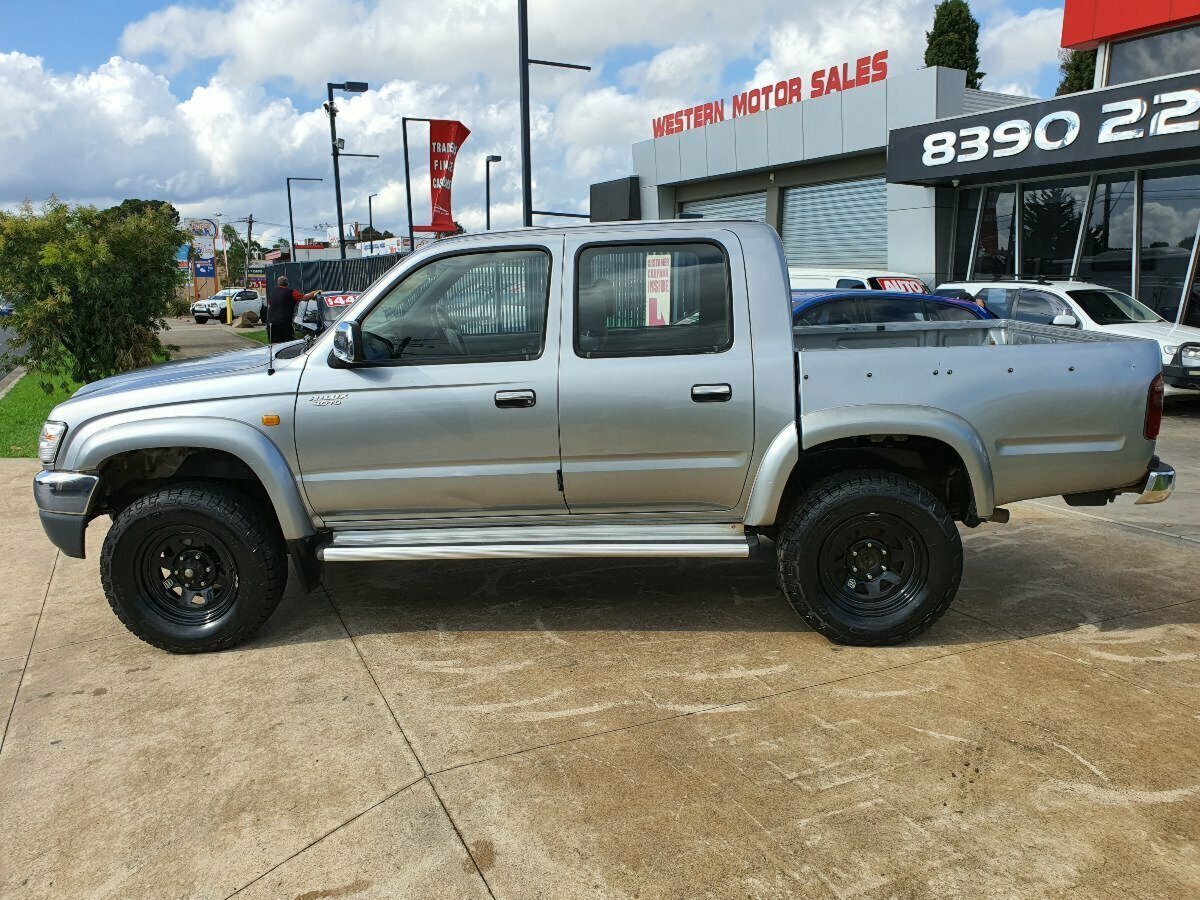 2004 TOYOTA HILUX KZN165R 5 SP MANUAL 4X4 4D DUAL CAB PICK-UP