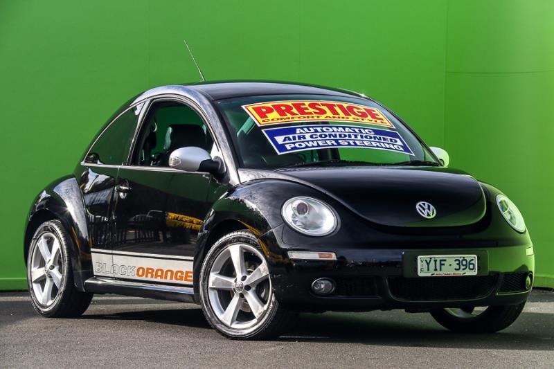 2010 VOLKSWAGEN BEETLE BlackOrange 9C