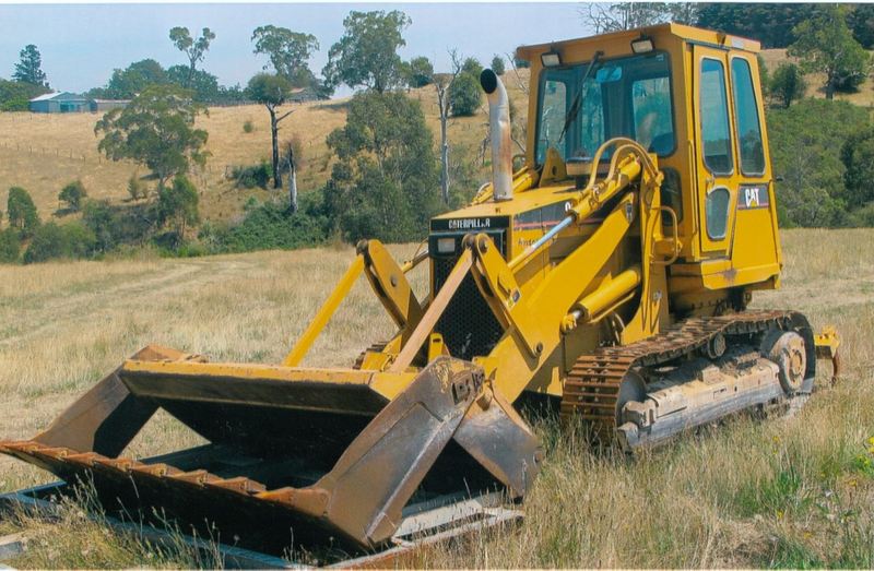 1999 CATERPILLAR 933C TRAXCAVATOR