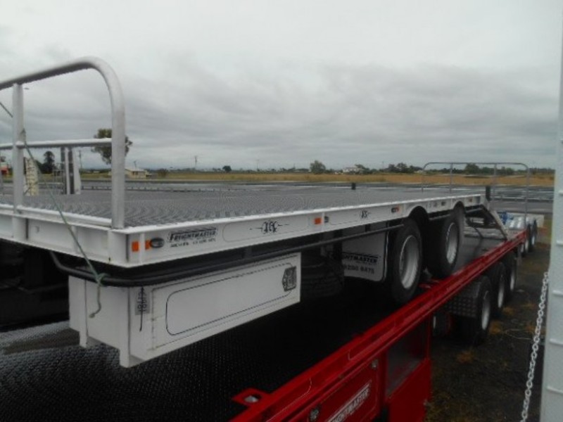 2015 Freightmaster TagPlant(with ramps) Pig Trailer