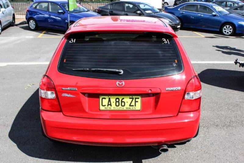 2002 MAZDA 323 ASTINA SHADES