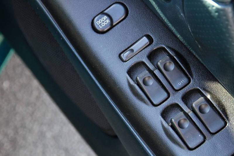 1996 MAZDA 323 ASTINA SHADES