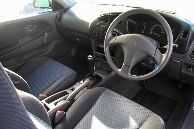 2003 MITSUBISHI MIRAGE CE