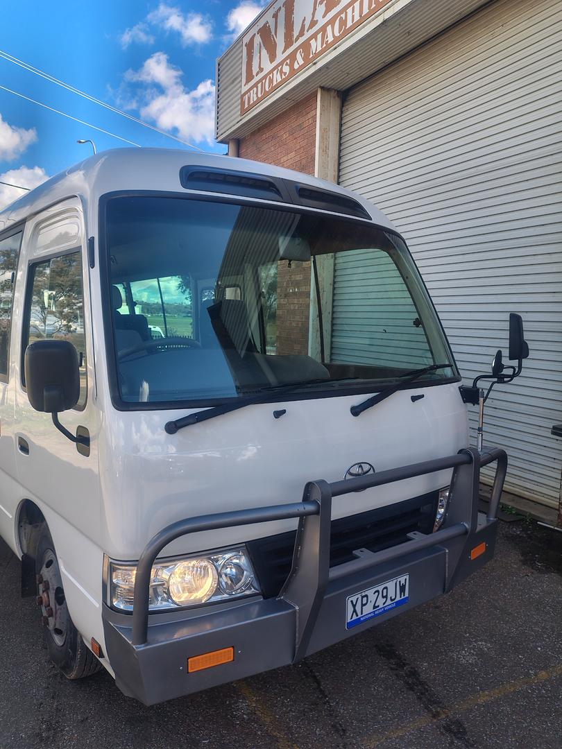 2010 TOYOTA COASTER XZB50R 07 UPGRADE DELUXE (LWB) 5 SP MANUAL BUS