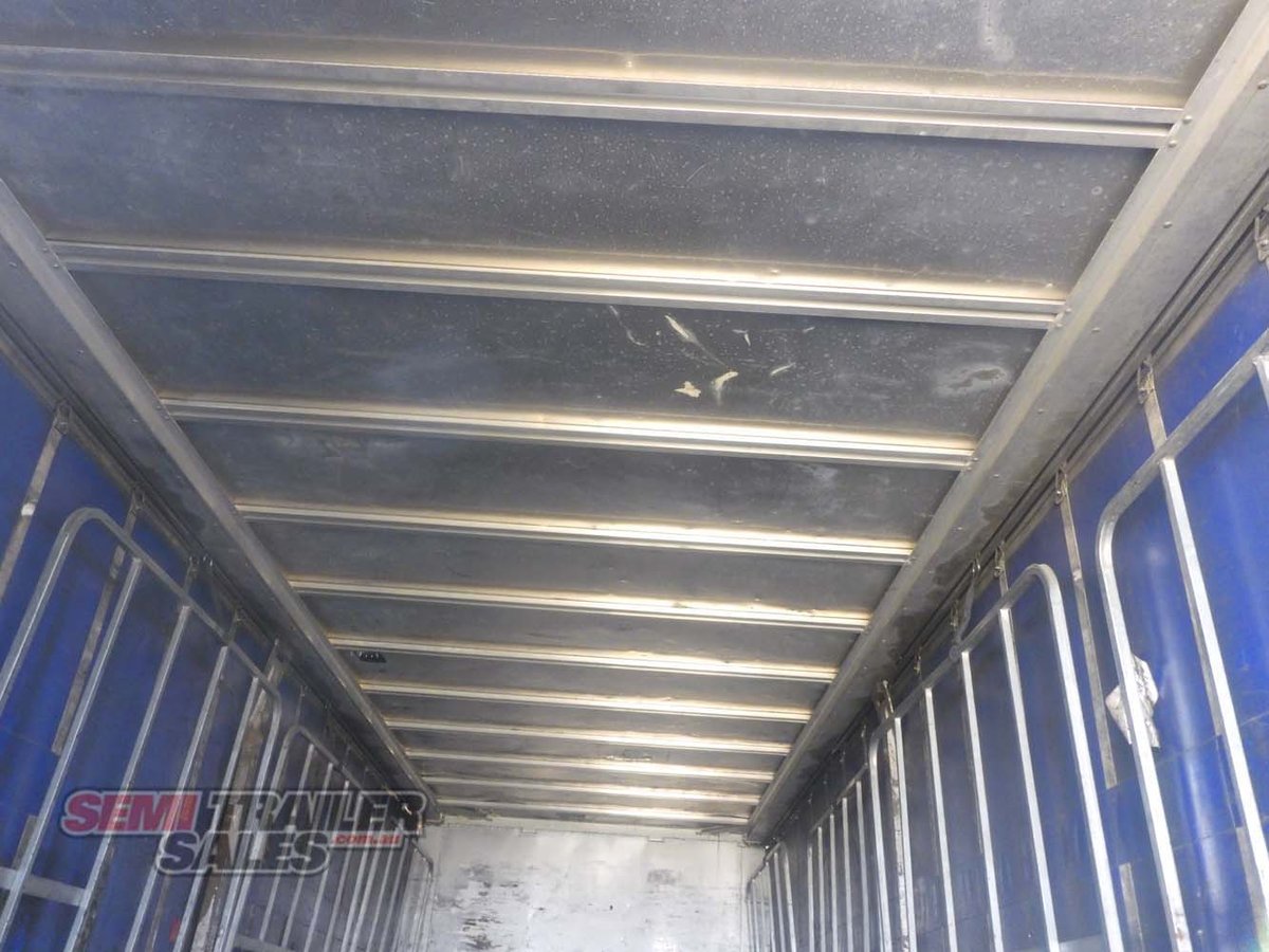2006 BARKER 12 PALLET ROLLBACK CURTAINSIDER TRAILER