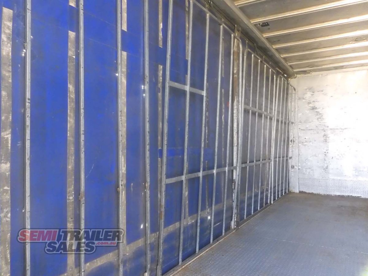 2006 BARKER 12 PALLET ROLLBACK CURTAINSIDER TRAILER