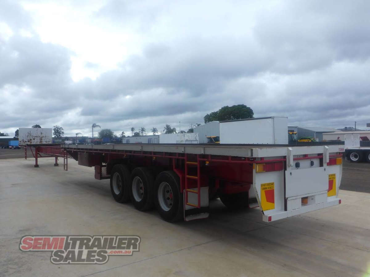 11/1999 HAULMARK 48FT-77FT EXTENDABLE FLAT TOP TRAILER