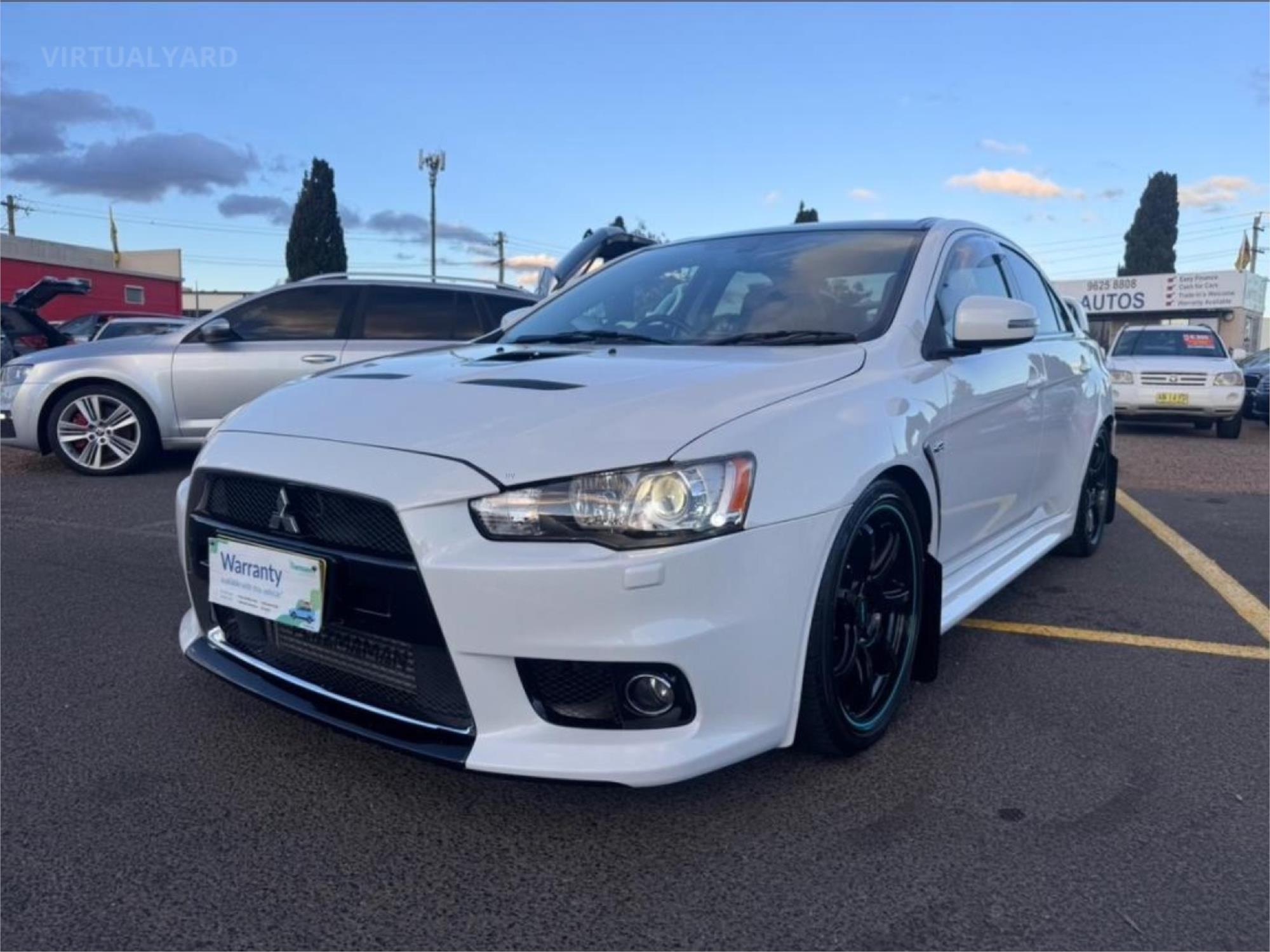 2015 MITSUBISHI LANCER CJ MY15 EVOLUTION MR 6 SP AUTO DIRECT SHIFT 4D SEDAN
