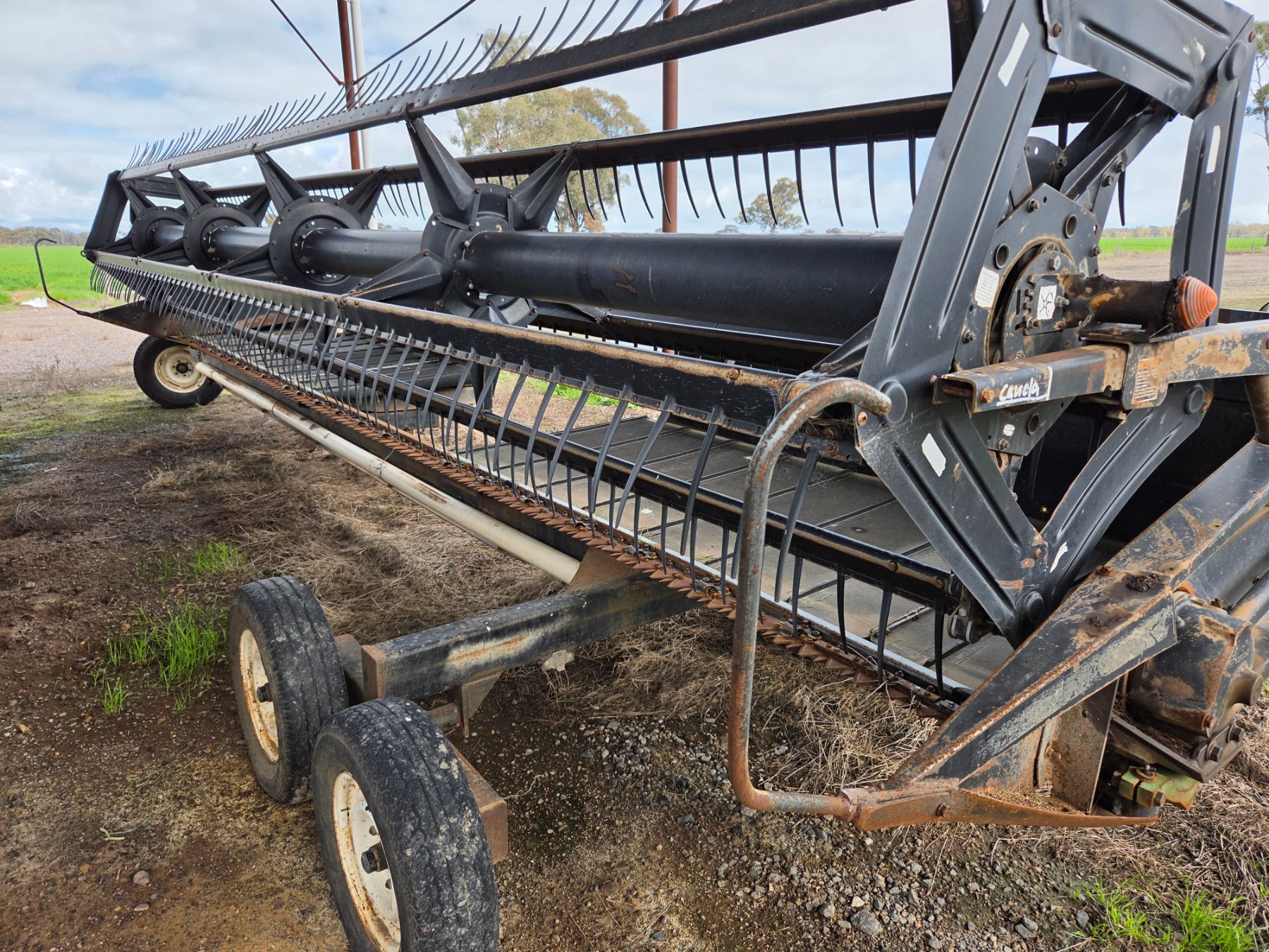 1995 MACDON 9000 SWATHER WITH HAYBINE FRONT