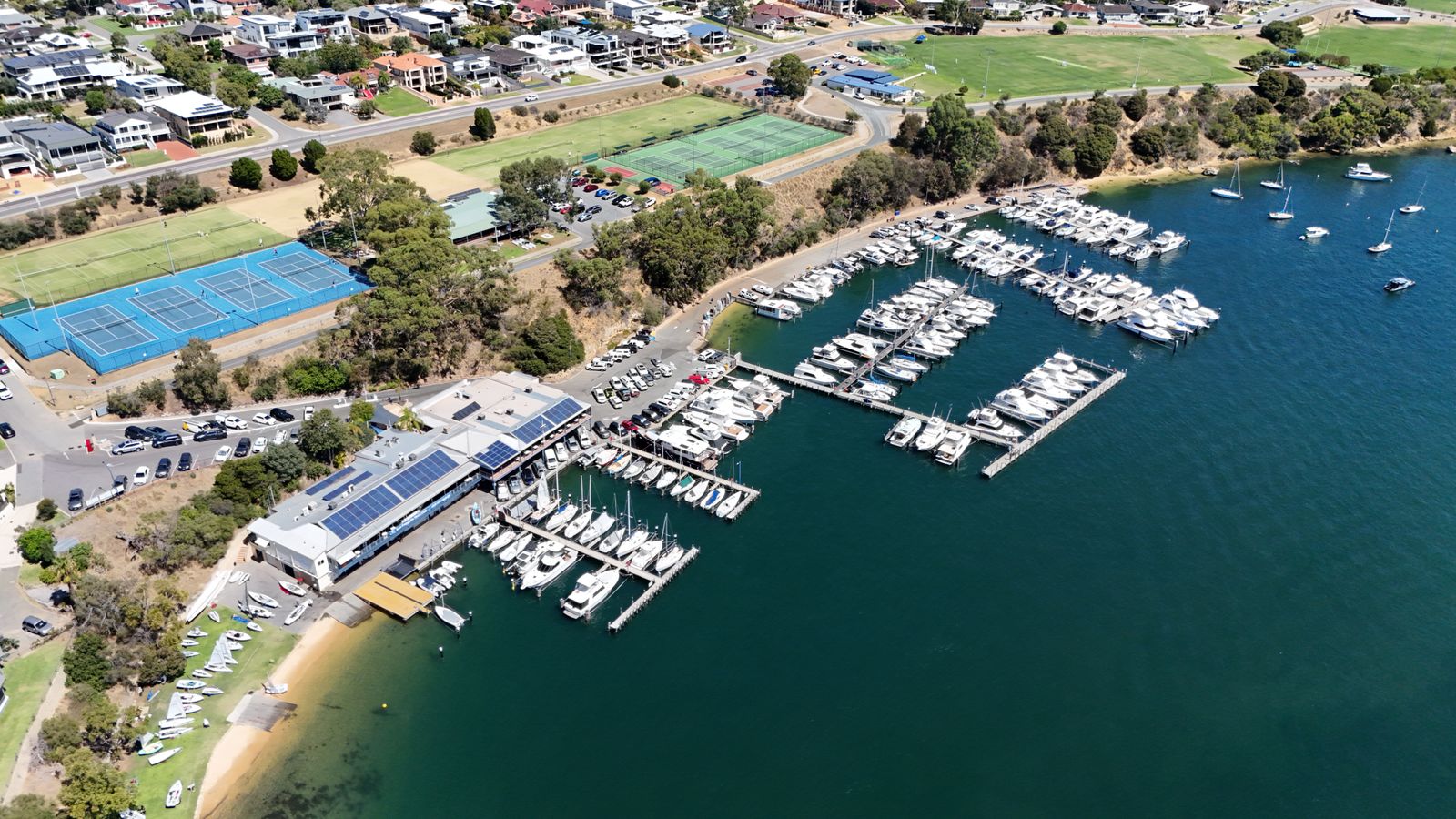 Aerial view of recreational boats moored at Bicton Yacht Club marina on the Swan River, Western Australia