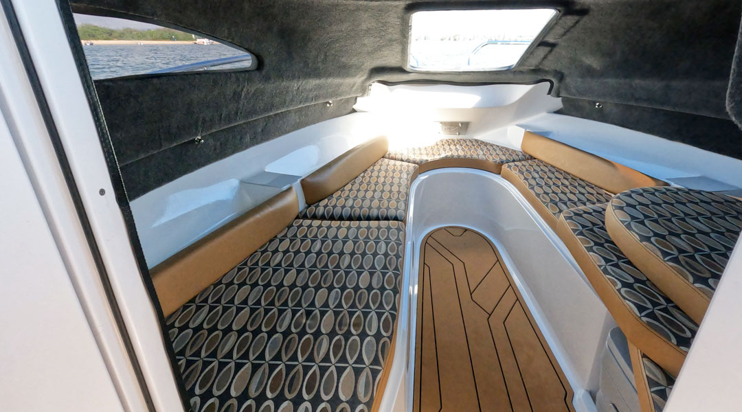 Forward cabin of the Stejcraft 640 Monaco, showing the vee berth seating