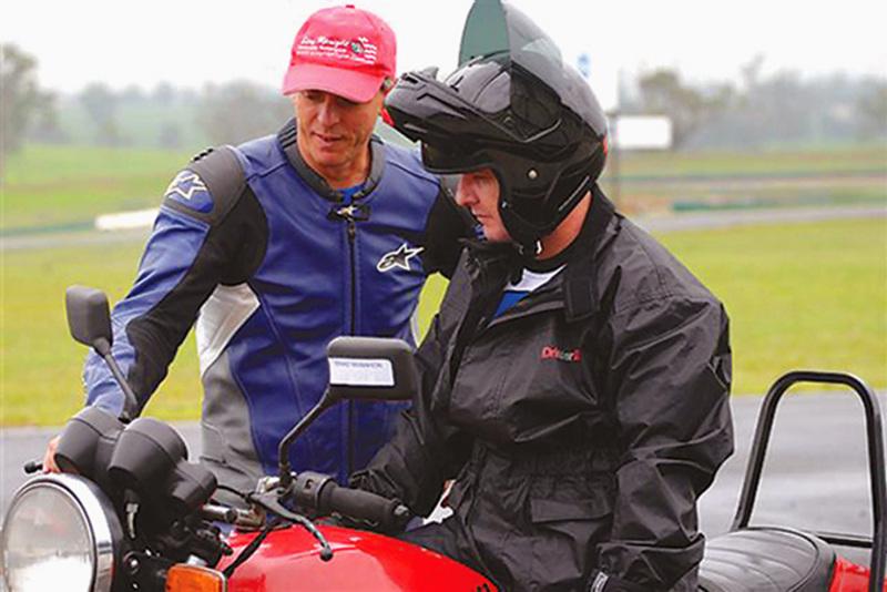 Stay Upright Instructor giving some tips to a rider