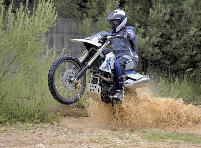 2007 BMW G 650 Xchallenge popping a mono as he exits a water crossing