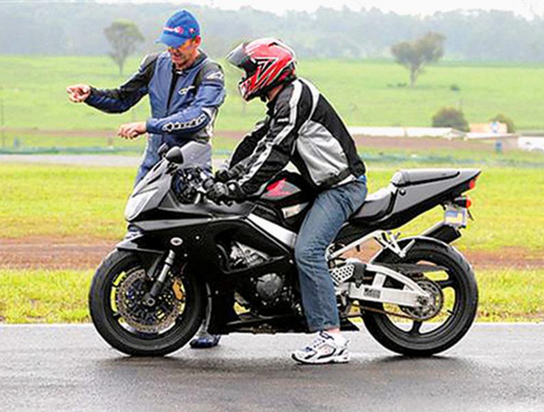 Stay Upright Instructor advising a motorcycle rider on technique