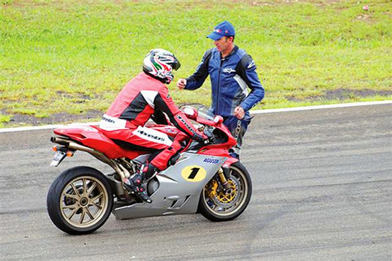 Stay Upright Instructor advising a motorcycle rider on technique