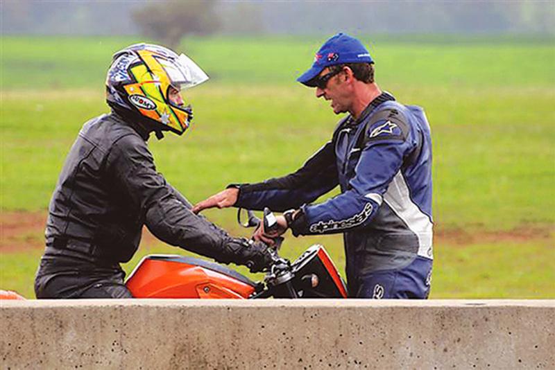 Stay Upright Instructor advising another motorcycle rider on technique